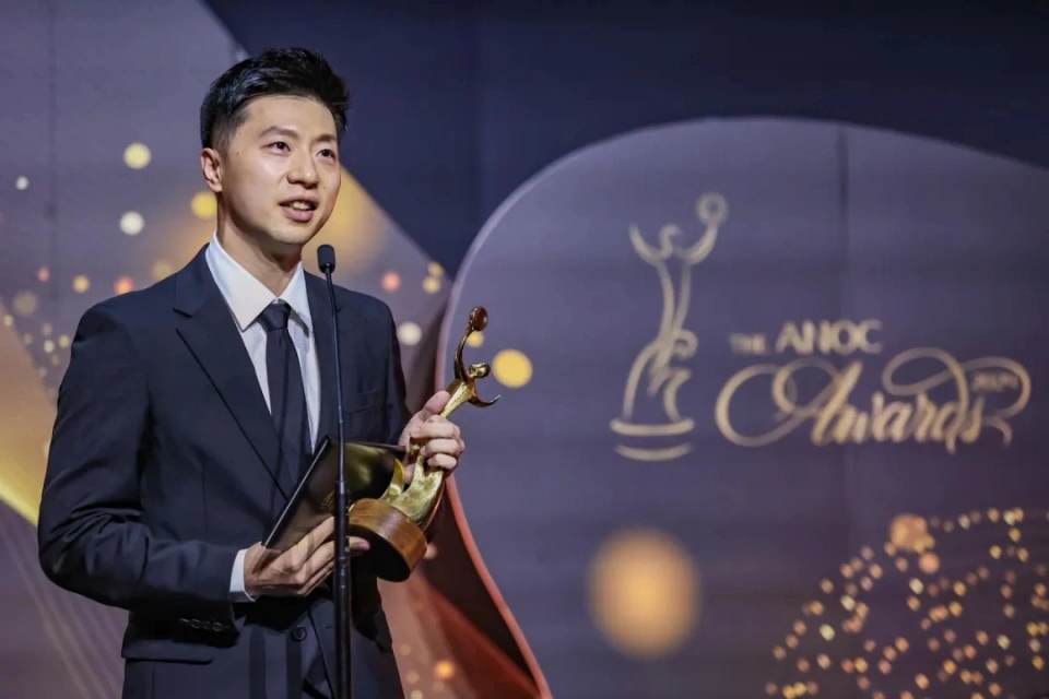 Ma Long receiving Outstanding Sports Career Award at ANOC General Assembly 2024